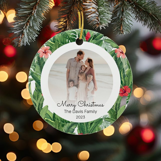 Merry Christmas Family Photo Tropical Flower Leaf  Ceramic Ornament (Personalizable family photo Christmas ornament decorated with tropical green leaves and red flowers)