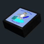 Merry Christmas Fishing Penguin Custom Gift Box<br><div class="desc">This awesome gift box features a cute little gray and white penguin with beady black eyes and yellow beak and feet. The penguin is holding a big blue fish with one flipper and standing on a pale blue lump of ice. There is an open present next to the penguin complete...</div>