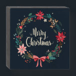 Merry Christmas Floral Wreath Wooden Box Sign<br><div class="desc">This holidays design features an elegant floral wreath with the text "Merry Christmas" in the centre in stylish modern script on a green background. #christmas #holidays #seasonal #festive #floral #elegant #stylish #modern #trendy #poinsettias #blossoms #blooms #foliage #bow #greeting #green #red #flowers #greetings #merry #rustic #country #christmasdecor #homedecor #decor #home #office...</div>