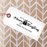Merry Christmas from (custom) Family,  Rubber Stamp<br><div class="desc">This christmas design features a lettering with a gift,  family name and holiday wishes.</div>
