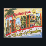 Merry Christmas from Florida vintage Postcard<br><div class="desc">Merry Christmas from Florida The Land of Sunshine vintage style based on the "Greetings from" postcards of the past. Bright retro colors with sun,  palm tree,  and beach along with letters filled with Florida scenes.</div>
