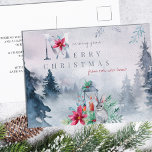 Merry Christmas from New Home Misty Winter Forest  Holiday Postcard<br><div class="desc">Beautiful moving announcement postcard to let everyone know you've moved for this holiday season. Watercolor misty winter forest design with elegant lettering, rustic lantern, woodland wildlife, christmas foliage and poinsettia flowers. Wishing you a Merry Christmas from our new home can be edited for a single person or a family and...</div>