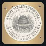 Merry Christmas Gold & Ivory Apiary Label<br><div class="desc">Vintage skep illustration with a few errant honey bees that have meandered to the edge of the sticker. Metallic Gold Border.</div>
