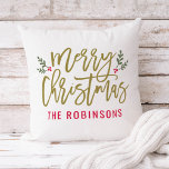 Merry Christmas Gold Modern Custom Family Throw Pillow<br><div class="desc">Seasonal pillow design features a modern antique gold script "Merry Christmas" with red custom text that can be personalized with your last name. Green branches of holly leaves and red berries accent the design. White background color.</div>