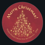 Merry Christmas! Golden Lights Tree on Crimson Red Classic Round Sticker<br><div class="desc">These beautiful Christmas stickers feature a beautiful design that is at once traditional and modern. There is a Christmas tree made completely of gold lights on a marbled crimson red background. The caption reads Merry Christmas, and there is space below for a short note or signature. Perfect as envelope seals...</div>