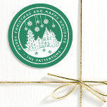 Merry Christmas Happy Holidays Winter Personalized Classic Round Sticker<br><div class="desc">Merry Christmas Happy Holidays Winter Personalized Name Stickers Labels features the text "Merry Christmas and Happy Holidays" in modern white script on a green background and personalized with your name surrounding a home with Christmas trees and snowflakes. Perfect for Christmas party favors and Holiday gifts or in the office for...</div>