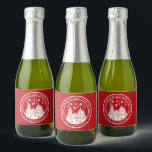 Merry Christmas Happy Holidays Winter Personalized Sparkling Wine Label<br><div class="desc">Merry Christmas Happy Holidays Winter Personalized Name sparkling wine Labels features the text "Merry Christmas and Happy Holidays" in modern white script on a red background and personalized with your name surrounding a home with Christmas trees and snowflakes. Perfect for Christmas party favors and Holiday gifts. Designed by ©Evco Studio...</div>