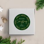 Merry Christmas Label Holly Wreath Faux Gold Foil<br><div class="desc">Finish off your Christmas packaging and gift wrapping with a personalized faux gold foil Merry Christmas stickers. This luxurious Holly Wreath Christmas round label includes a gold wreath and gold script font over a dark green background,  with a space for your name or family surname.</div>