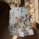 Merry Christmas Minimalist Fun Typography Photo Gift Tags<br><div class="desc">Elevate your holiday gifting with the "Merry Christmas Minimalist Fun Typography Photo Gift Tags." These elegantly designed tags embody a clean and simple aesthetic, seamlessly blending modern minimalist style with classic vintage Christmas charm. Featuring stylish handwritten script and elegant typography, they offer a warm and festive touch to every gift....</div>