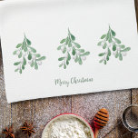 Merry Christmas Mistletoe Kitchen Towel<br><div class="desc">This Merry Christmas kitchen towel is decorated with watercolor mistletoe foliage and berries.
Easily customizable.
Use the Design Tool to change the text size,  style,  or color.
As we create our artwork you won't find this exact image from other designers.
Original Watercolor © Michele Davies.</div>