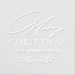 Merry Christmas Modern Personalized Family Name Embosser<br><div class="desc">This stylish custom holiday embosser includes a modern and elegant Merry Christmas typography design with custom text that can be personalized with your family's last name. Holiday greenery with leaves and berries adds a festive touch to the bottom of the design.</div>