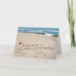 Merry Christmas on beach Holiday Card<br><div class="desc">Santa hat on the beach for Merry Christmas.</div>