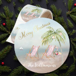 Merry Christmas on the Beach Family Name  Classic Round Sticker<br><div class="desc">Doesn't this tell a great story -- it is still a Merry Christmas on the beach moment -- whether you are actually on the beach or might like to imagine that you are -- this artistic watercolor sticker will take you there. Enjoy and it would make a really fun and...</div>
