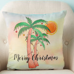 Merry Christmas Palm Trees Colorful Throw Pillow<br><div class="desc">This Christmas Pillow features hand painted palm trees decorated with lights and baubles on a watercolor background.
Because we create our own artwork you won't find this exact image from other designers.
Original Watercolor © Michele Davies.</div>
