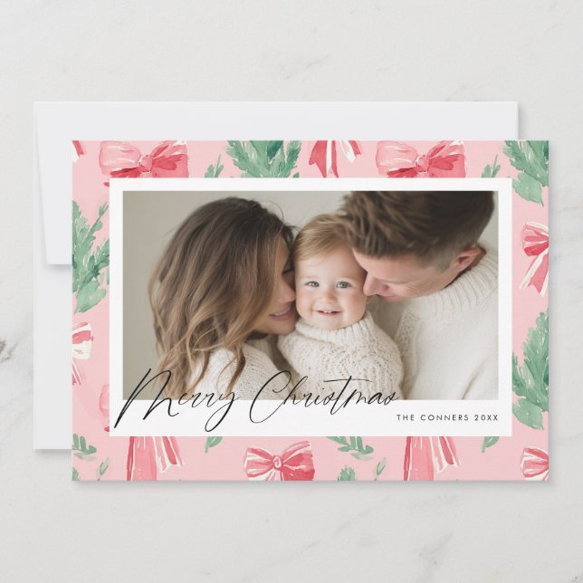 Merry Christmas pink bows and green sprig Holiday Card (Front)
