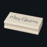 Merry Christmas Rubber Stamp<br><div class="desc">This wooden rubber stamp is shown with a Merry Christmas phrase print. 
Customize this item or buy as is.</div>