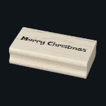Merry Christmas Rubber Stamp<br><div class="desc">This wooden rubber stamp is shown with a Merry Christmas phrase print. 
Customize this item or buy as is.</div>