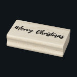 Merry Christmas Rubber Stamp<br><div class="desc">This wooden rubber stamp is shown with a Merry Christmas phrase print. 
Customize this item or buy as is.</div>
