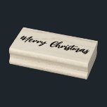 Merry Christmas Rubber Stamp<br><div class="desc">This wooden rubber stamp is shown with a Merry Christmas phrase print. 
Customize this item or buy as is.</div>