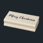 Merry Christmas Rubber Stamp<br><div class="desc">This wooden rubber stamp is shown with a Merry Christmas phrase print. 
Customize this item or buy as is.</div>