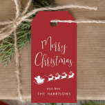 Merry Christmas Santa Reindeer Sleigh Red Gift Tags<br><div class="desc">Fun Christmas holiday red and white gift tags featuring a silhouette of reindeers flying Santa's sleigh through air,  "Merry Christmas" in a modern script and your name in simple typography.</div>