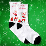 Merry Christmas Santa Serving Tennis Balls Socks<br><div class="desc">This original design features Santa practicing his tennis swing before the big night.</div>