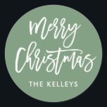 Merry Christmas Script Green Personalized Classic Round Sticker<br><div class="desc">Use the template form to add your personalization. Choose the option "customize further" to change the background color and/or font.</div>
