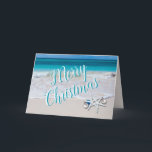Merry Christmas Starfish on Beach Christmas Card<br><div class="desc">Folded beach Christmas cards with starfish and text templates. "Merry Christmas" on the front in big white letters can be changed to any greeting you choose. Inside add a message and signature. Two starfish are decorated with tree ornaments and are set over a beach scene with turquoise blue water and...</div>