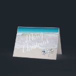 Merry Christmas Starfish on Beach Christmas Card<br><div class="desc">Folded beach Christmas cards with starfish and text templates. "Merry Christmas" on the front in big white letters can be changed to any greeting you choose. Inside add a message and signature. Two starfish are decorated with tree ornaments and are set over a beach scene with turquoise blue water and...</div>