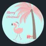 Merry Christmas  -  Sweet Tropical Santa Flamingo  Classic Round Sticker<br><div class="desc">NewParkLane - Personalized Christmas Stickers,  featuring a tropical scene with a cute pink flamingo wearing a Santa hat,  and a decorated pink palmtree with Christmas presents. 
Check out this collection for matching items!</div>