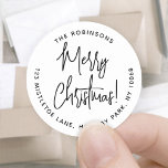 Merry Christmas Trendy Script Round Return Address Classic Round Sticker<br><div class="desc">Add a stylish finishing touch to holiday card envelopes with chic Merry Christmas return address envelope seals. All wording on this template is simple to customize or delete. The black and white design features modern handwritten script calligraphy and minimalist typography address in a circle. These unique round return address labels...</div>
