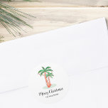 Merry Christmas Tropical Palm Tree Classic Round Sticker<br><div class="desc">These Merry Christmas stickers are decorated with a tropical palm tree covered in lights and baubles.
Easily customizable.
Original Watercolor © Michele Davies.</div>