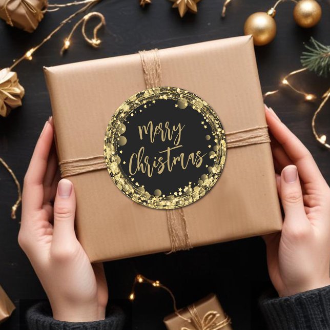 Merry Christmas Twinkling Gold Stars Classic Round Sticker (Merry Christmas twinkling gold stars round stickers)