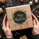 Merry Christmas Twinkling Gold Stars Square Sticker<br><div class="desc">Twinkling gold stars,  circles and dots surround the words "Merry Christmas" on black square stickers are perfect for your holiday gift giving and more. MATCHING items in our store.</div>