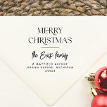Merry Christmas Typography Script Name & Address Self-inking Stamp<br><div class="desc">A modern self-inking stamp with 'Merry Christmas' in elegant serif typography. Your family name appears below in a handwriting-style script. At the bottom of the stamp, your address or contact details are written in simple sans-serif capitals. Made to match our Merry Moments | Modern Christmas 9 Photo Collage Holiday Collection,...</div>