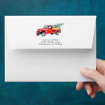 Merry Christmas | Watercolor Red Truck Holiday Envelope<br><div class="desc">Featuring a vintage red farmhouse truck with Christmas tree. Choose one of our beautiful envelopes to make your mailing unique and compliment your important correspondence. Make your holiday invitations and Christmas cards pop with our festive, icon envelopes. Add your custom wording to this design by using the "Edit this design...</div>