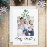 Merry Christmas Winter Greenery Mistletoe Photo Holiday Card<br><div class="desc">This simple and stylish Christmas card is decorated with watercolor mistletoe greenery and script typography.
Easily customizable with your photo.
Original Watercolor © Michele Davies.</div>