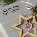 Merry Christmas with love from the (custom) family Rubber Stamp<br><div class="desc">This christmas design features a monogram with family holiday wishes.</div>