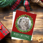 Merry Christmas Wreath Cute Custom Cat Photo Red Postcard<br><div class="desc">Beautiful custom pet Christmas postcard featuring a green holiday wreath with a red background white text. Replace with your cat's photo in the center of the wreath or add a kitten picture for your friends and family. Merry Christmas is written in white.</div>