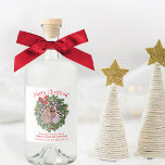 Merry Christmas Wreath Photo Frame Fun Holiday Liquor Bottle Label<br><div class="desc">These liquor bottle labels are perfect for home brewed spirits, or simply for sending holiday cheer. The design features a fun evergreen wreath photo frame with a red bow, bells and holly berries - upload your picture and it will appear in the center of the wreath. The caption reads: Merry...</div>