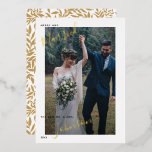 Merry & Married Script Wedding Photo Foil Holiday<br><div class="desc">Introducing the Merry & Married Script Wedding Photo Holiday Card! This beautiful modern card design features your favorite wedding photo, with 'married' and your married name in real gold, silver or rose gold foil hand lettered script. You can also edit the text to say whatever you want, and the back...</div>