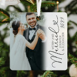Merry & Married Simple Photo Christmas Metal Ornament<br><div class="desc">Newlywed keepsake christmas ornament featuring a simple white background,  a photo either side of the bride & groom,  the saying 'merry and married' in a elegant script heart font,  their names,  and the year.</div>