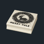 Merry Yule Goat                                    Rubber Stamp<br><div class="desc">A rustic “Merry Yule” design featuring a festive goat surrounded by a wreath of evergreens. Inspired by Scandinavian and pagan holiday traditions, this design celebrates the warmth, humor, and natural spirit of Yule. Perfect for those who honor winter solstice, folk art, or a cozy handmade aesthetic. Merry Yule Goat "merry...</div>