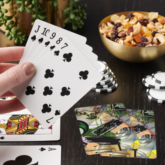 Mess of design objects & symbols with rough effect poker cards (In Situ)
