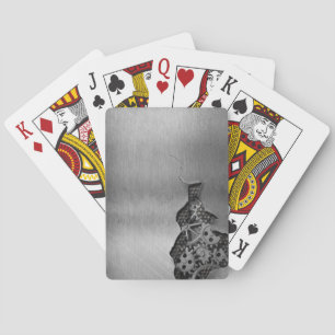 Metal background with mechanical damage poker cards