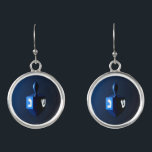 Metallic Blue Dreidel Earrings<br><div class="desc">A modernistic,  metallic,  blue dreidel against a dark,  night-like background.  Two of the Hebrew letters found on a dreidel,  nun and shin,  glow brightly.</div>