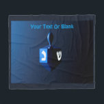 Metallic Blue Dreidel Fleece Blanket<br><div class="desc">A modernistic,  metallic blue dreidel against a dark,  night-like background.  Two of the Hebrew letters found on a dreidel,  nun and shin,  glow brightly.  Add your own text.</div>