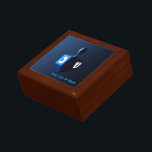 Metallic Blue Dreidel Jewelry Box<br><div class="desc">A modernistic,  metallic blue dreidel against a dark,  night-like background.  Two of the Hebrew letters found on a dreidel,  nun and shin,  glow brightly.  Add your own text.</div>