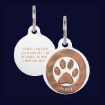 Metallic Copper Paw Print Pet ID Tag<br><div class="desc">Beautiful copper,  metallic,  paw print surrounded by a copper circle on front with white background and white,  curved name template at bottom of circle.  Personalized template info on back to make it yours.</div>