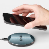 Metallic light blue-gray background wireless charger  (Hand)